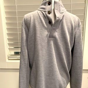 Footjoy 3/4 long sleeve button black shirt.